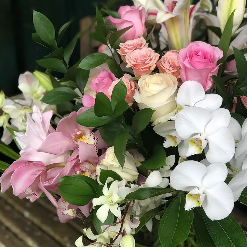 A bouquet of flowers is sitting on the table.