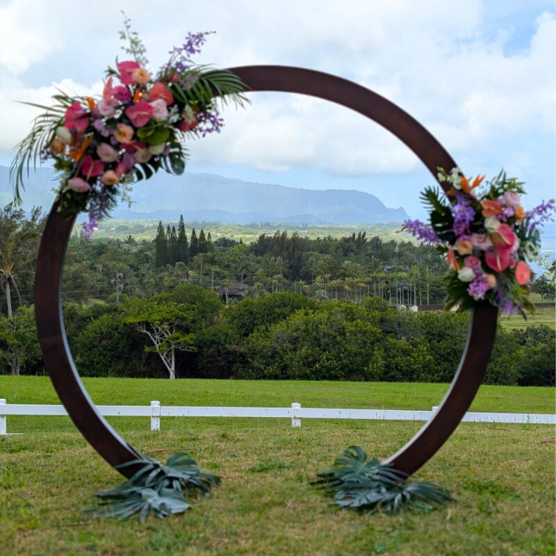 isle flowers signature arch looking over the coast