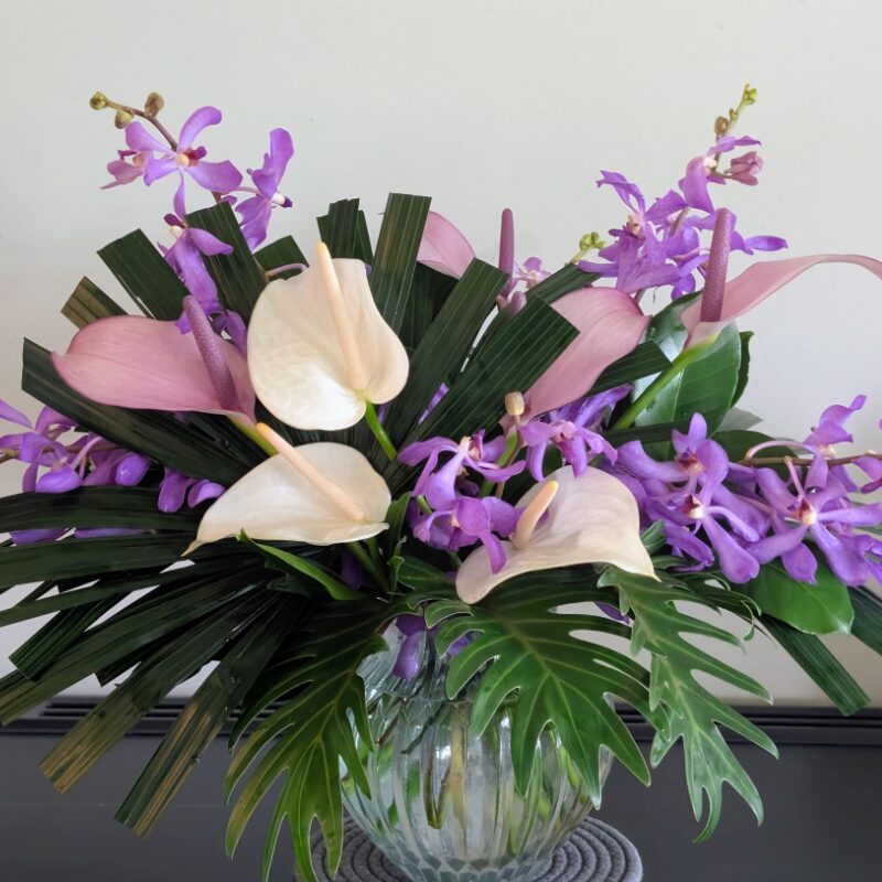 bouquet with pink and white anthuriums and purple flowers